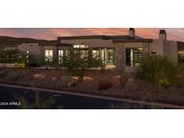 Luxury home with modern design and landscape lighting at 30505 N Sage Dr, Peoria, AZ 85383