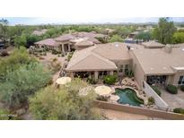 Aerial view of home showcasing backyard pool and desert landscape at 33231 N 72Nd Pl, Scottsdale, AZ 85266