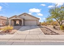 Charming single-story home with a two-car garage and well-manicured landscaping at 4657 E Matt Dillon Trl, Cave Creek, AZ 85331