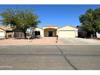 Newly built single-story home with a two-car garage at 414 E 5Th St, Eloy, AZ 85131