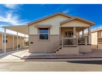 Charming single-wide manufactured home with covered carport at 9333 E University Dr # 58, Mesa, AZ 85207