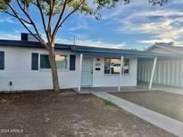 Mid-century ranch home with updated facade and landscaping at 2617 W Osborn Rd, Phoenix, AZ 85017