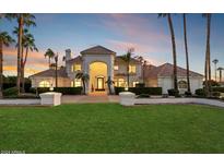 Elegant two-story home with a beautifully landscaped lawn at 3943 E Laurel St, Mesa, AZ 85215