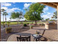 Relaxing backyard oasis with golf course views at 2606 N 159Th Dr, Goodyear, AZ 85395