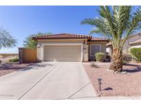 One-story home with attached garage and desert landscaping at 2194 N Hudson Ct, Florence, AZ 85132