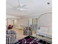 Spacious living room featuring comfortable seating and large windows at 5132 N 31St N Way # 134, Phoenix, AZ 85016