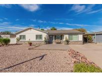 Charming single-story home with a well-maintained front yard at 2518 E Campbell Ave, Phoenix, AZ 85016