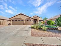 Charming single story home with a spacious driveway and landscaping at 916 E Beautiful Ln, Phoenix, AZ 85042