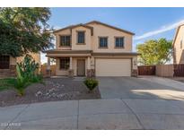 Two-story house with a large driveway and front yard at 28614 N Sunset Dr, San Tan Valley, AZ 85143