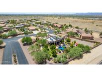 Aerial view showcasing house and neighborhood at 11305 S 195Th Dr, Buckeye, AZ 85326