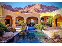 Expansive pool and patio area with mountain views at 4836 E White Gates Dr, Phoenix, AZ 85018