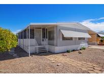 Nice manufactured home with covered porch and landscaping at 2650 W Union Hills Dr # 258, Phoenix, AZ 85027