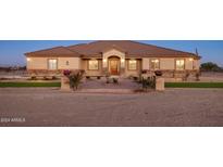 Stunning ranch home with stone accents and landscaped entryway at 28847 N Royce Rd, San Tan Valley, AZ 85144