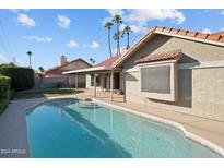 Stunning pool with steps and a spacious backyard at 7631 W Mcrae Way, Glendale, AZ 85308