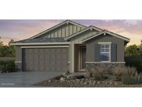 Two-story house with a gray exterior, two-car garage, and desert landscaping at 4107 E Ghost Flower Ln, San Tan Valley, AZ 85140
