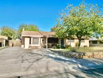 House exterior, showcasing front yard and driveway at 346 W Greenwich Rd, Kearny, AZ 85137