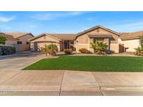 Single-story home with a landscaped lawn and two-car garage at 3514 E Parkview Dr, Gilbert, AZ 85295
