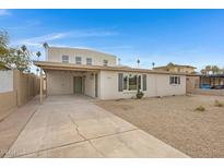 Newly renovated home with a modern facade and landscaping at 2321 N 30Th St, Phoenix, AZ 85008