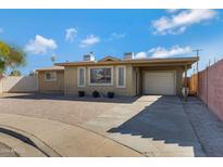 A single story home with a single car garage and nicely landscaped yard at 1859 N Morris --, Mesa, AZ 85201