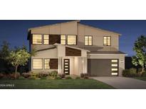 Two story modern home with gray siding and a two car garage at 6145 S Antonio --, Mesa, AZ 85212