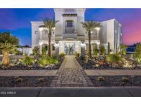 Stunning two-story home with beautiful landscaping at 1480 E Raven Ct, Gilbert, AZ 85297