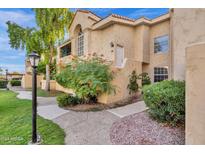 Condo building exterior with walkway at 1333 E Morten Ave # 127, Phoenix, AZ 85020