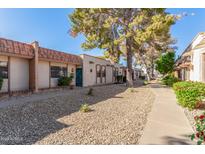 Attractive building exterior with landscaped walkways at 949 N Revere St, Mesa, AZ 85201