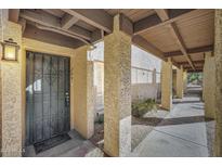 Private entryway with covered walkway leading to the front door at 7402 E Carefree Dr # 209, Carefree, AZ 85377