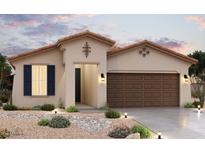 Beautiful Spanish style home with a two car garage and desert landscaping at 21537 W Papago St, Buckeye, AZ 85326