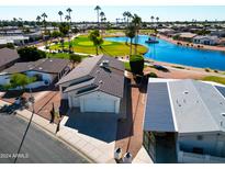 Aerial view of single-story home near lake and golf course at 2336 N Salem St, Mesa, AZ 85215