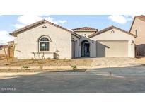 Beautiful home with stucco exterior and two car garage at 22466 E San Tan Blvd, Queen Creek, AZ 85142