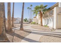 Complex exterior showing walkway, landscaping, and building exteriors at 3840 N 43Rd Ave # 58, Phoenix, AZ 85031