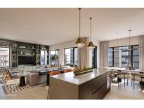 Open living room and kitchen with modern design at 19360 N 73Rd St # 1078, Scottsdale, AZ 85255