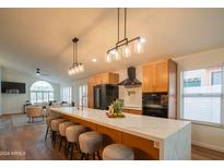 Open kitchen with large island, perfect for entertaining at 1933 E Wescott Dr, Phoenix, AZ 85024