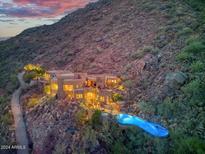 Stunning home nestled in the mountains with a large pool at 5802 E Cholla Ln, Paradise Valley, AZ 85253