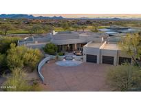 Luxury home with expansive views and a large driveway at 10119 E Horizon Dr, Scottsdale, AZ 85262