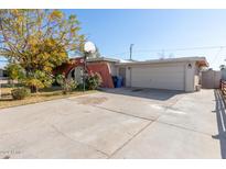Ranch style home with attached garage and carport at 3433 W Poinsettia Dr, Phoenix, AZ 85029