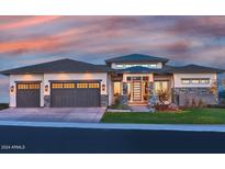 Stunning home with three-car garage and stone accents at 5516 W Melinda Ln, Glendale, AZ 85308