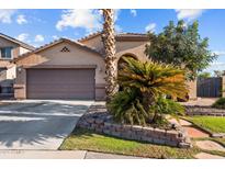 Single story home with two car garage and desert landscaping at 15912 W Central St, Surprise, AZ 85374