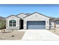 One-story home with gray exterior and blue garage door at 1988 W Cameron Blvd, Coolidge, AZ 85128
