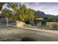 Gated entrance to community with mountains in background at 10169 E Dinosaur Ridge Rd, Gold Canyon, AZ 85118