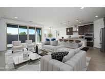 Open concept living and kitchen area with modern design at 735 E Marblewood Way, Phoenix, AZ 85048