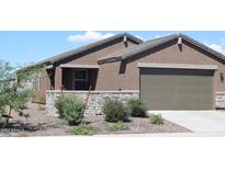 Single story home with two car garage and desert landscaping at 3722 E Haflinger Rd, San Tan Valley, AZ 85140