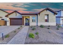 Single-story home with appealing curb appeal and a 2-car garage at 21715 N 61St Way, Phoenix, AZ 85054