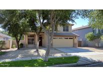 Two story house exterior with landscaping at 3473 E Bruce Ave, Gilbert, AZ 85234