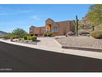 Stunning two-story home with desert landscaping and mountain views at 1044 W Indian Hills Pl, Phoenix, AZ 85023