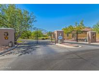 Gated community entrance with signage at 3525 N Carlton St, Buckeye, AZ 85396