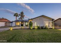 Updated single-level home with solar panels, landscaping, and a spacious yard at 3743 W Dailey St, Phoenix, AZ 85053
