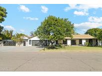 Beautiful Ranch home with a large front yard and 2 car garage at 1101 N Christa Way, Tolleson, AZ 85353