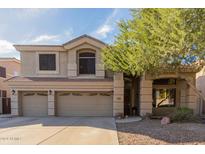 Two-story house with three-car garage and landscaping at 25714 N 70Th Ln, Peoria, AZ 85383